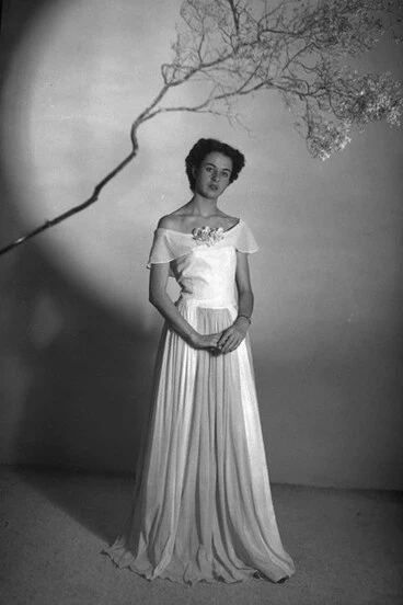 Image: Gown with a cape gathered skirt