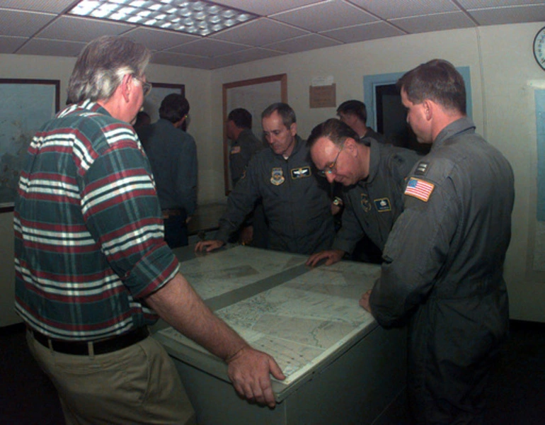 Image: MGEN James Haight (third from right) the Mobilization Assistant to Commander 15th Air Force, Travis Air Force Base, California and MGEN John M. Miller (second from right), the Mobilization Assistant to the Commander of Air Mobility Command, Scott Air Force Base, Illinois look over a map of Antarctica while visiting the U.S. National Science Foundation's facilities. The generals' visit is to observe the Air Force's participation in the joint, U.S. Armed Forces and New Zealand Defense Force, military operation which provides logistic support to the U.S. National Science Foundation's Program on Antarctica