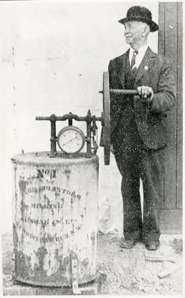 Image: Mr Holben with the First Milking Machine in New Zealand