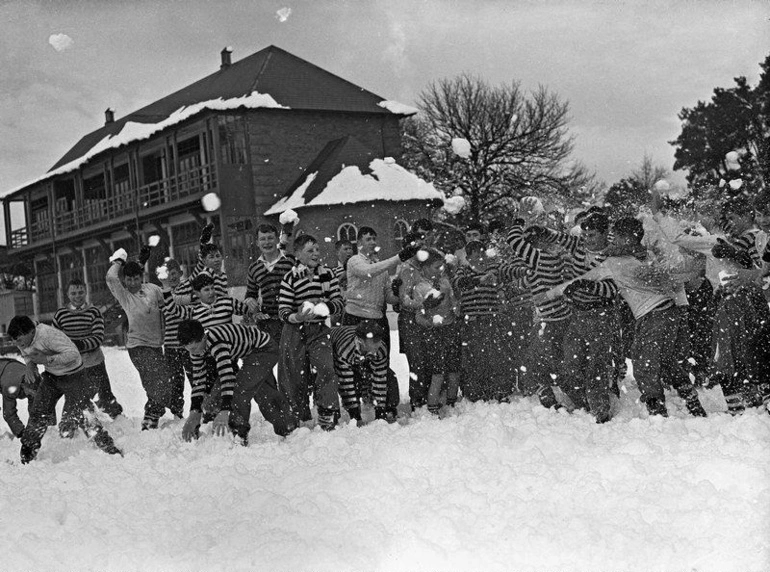 Image: Education, School. Boys pose in Snow Fight. Christ's College ( Black and White Stripes ) Christchurch Canterbury, New Zealand. 1945?