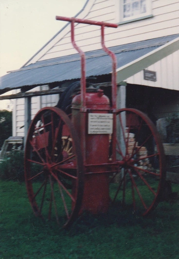 Image: Vintage large wheeled fire extinguisher at Howick Historical Village.