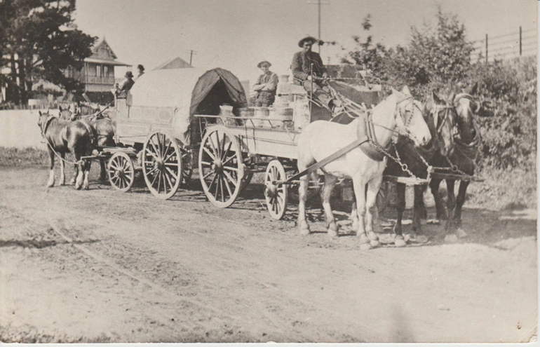 Image: Albert Martin Mattson transfering milk from his farm to his son's wagon