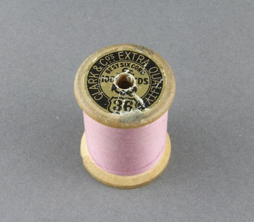Image: Sewing thread on spool, pink cotton