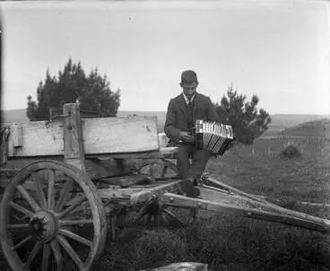Man playing an accordion at Strathmore, 1910 Image: Man playing an accordion at Strathmore, 1910