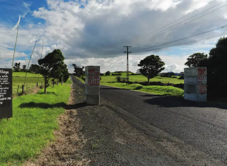 Image: Protest signs, Ihumatao Quarry Road, Māngere, 2017