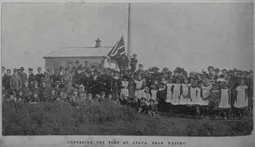 Image: Unfurling the flag at Otaua, near Waiuku