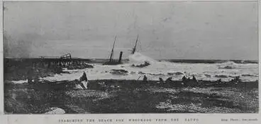 Searching the beach for wreckage from the Taupo Image: Searching the beach for wreckage from the Taupo