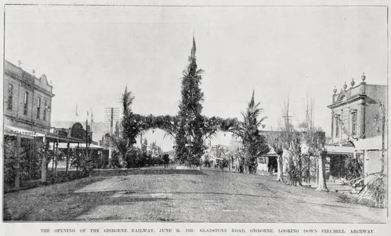 Image: Gladstone Road looking towards the decorated fire bell archway for the opening of the Gisborne-Auckland railway, 26 June 1902