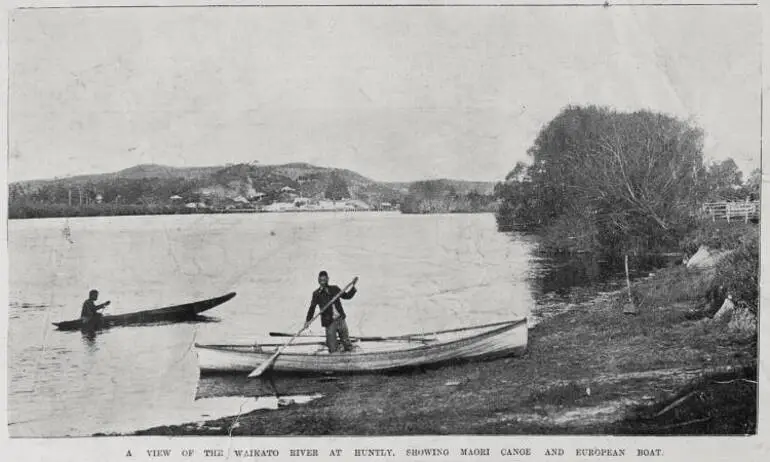 Image: A view of the Waikato River at Huntly with a Maori canoe and a European boat