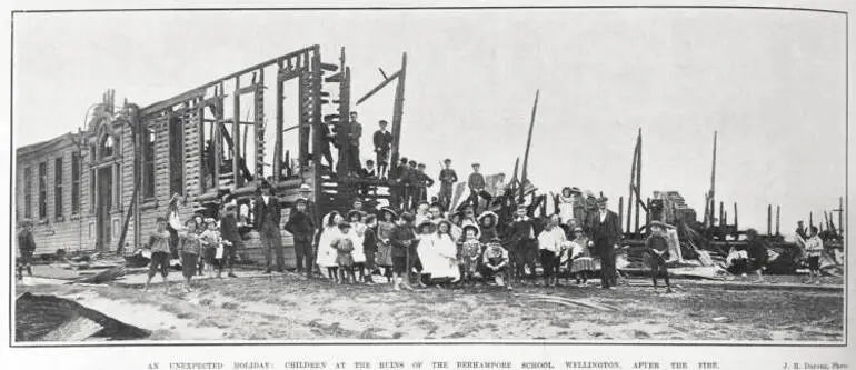 Image: An unexpected holiday: children at the ruins of the Berhampore School, Wellington, after the fire