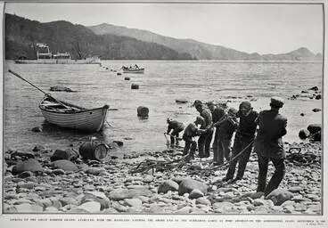 Image: LINKING UP THE GREAT BARRIER ISLAND, AUCKLAND, WITH THE MAINLAND: LANDING THE SHORE END OF THE SUBMARINE CABLE AT PORT CHARLES ON THE COROMANDEL COAST, SEPTEMBER 26, 1908