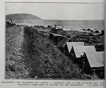 STRAIGHTENING THE WELLINGTON- HUTT RAILWAY: A WORKMAN'S CAMP ON THE MANAWATU LINE, NEAR PAIKAKARIKI, WHERE METAL IS OBTAINED FOR THE RECLAMATION Image: STRAIGHTENING THE WELLINGTON- HUTT RAILWAY: A WORKMAN'S CAMP ON THE MANAWATU LINE, NEAR PAIKAKARIKI, WHERE METAL IS OBTAINED FOR THE RECLAMATION
