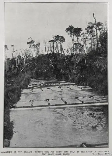 GOLDMINING IN NEW ZEALAND: METHOD USED FOR SAVING FINE GOLD IN THE RIVER AT CHARLESTON, WEST COAST, SOUTH ISLAND Image: GOLDMINING IN NEW ZEALAND: METHOD USED FOR SAVING FINE GOLD IN THE RIVER AT CHARLESTON, WEST COAST, SOUTH ISLAND