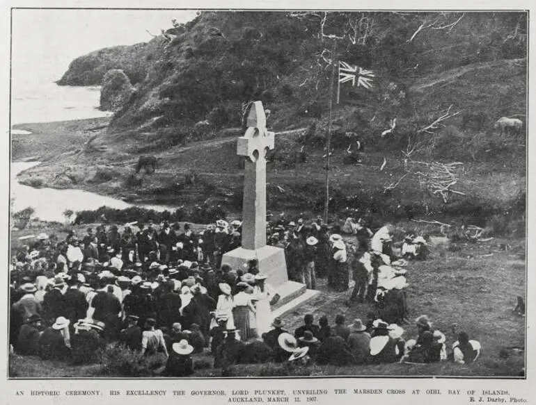 Image: AN HISTORIC CEREMONY: HIS EXCELLENCY THE GOVERNOR. LORD PLUNKET, UNVEILING THE MARSDEN CROSS AT OIHI BAY OF ISLANDS, AUCKLAND, MARCH 12, 1907