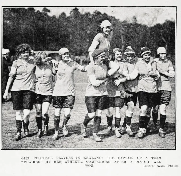 Image: Girl football players in England: the captain of a team chaired by her athletic companions after a match was won