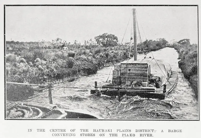 Image: In the centre of the Hauraki Plains district: a barge conveying stores on the Piako River