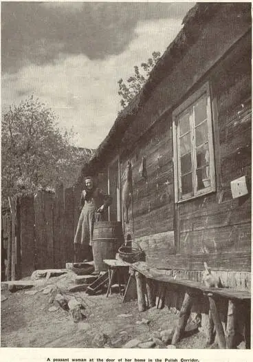 Image: A peasant woman at the door of her home in the Polish Corridor