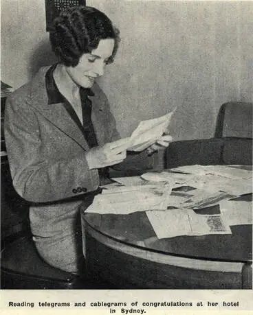 Image: Reading telegrams and cablegrams of congratulations at her hotel in Sydney