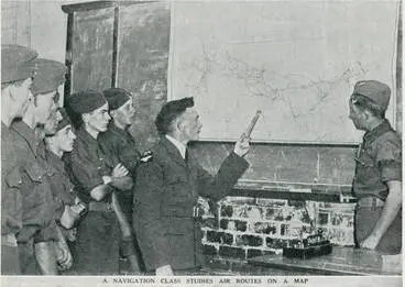 Image: A navigation class studies air routes on a map
