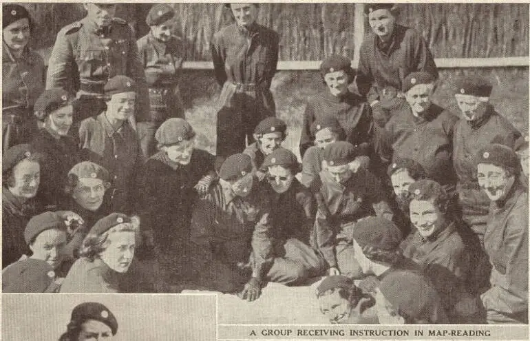 Image: A group receiving instruction in map-reading