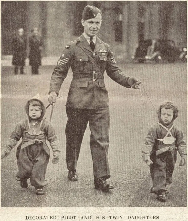Image: Decorated pilot and his twin daughters