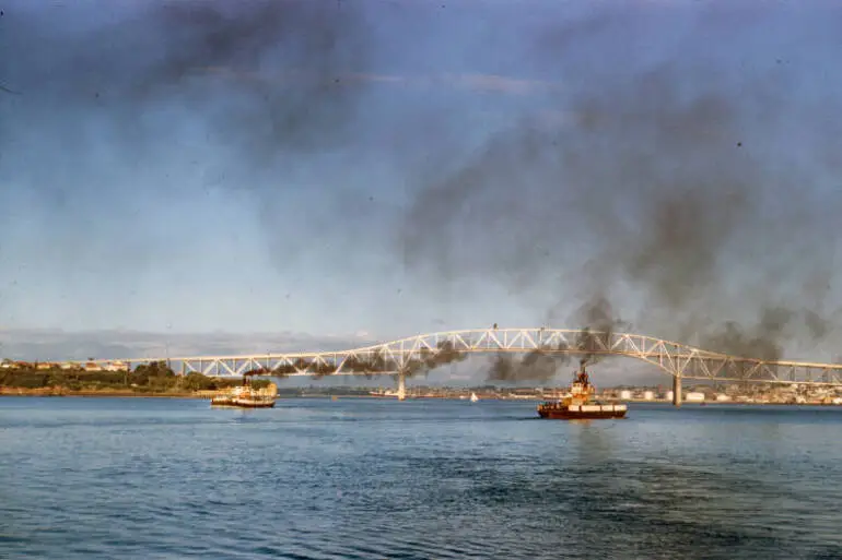 Image: Tug and ferry participating in Auckland Harbour Bridge opening celebrations, 1959