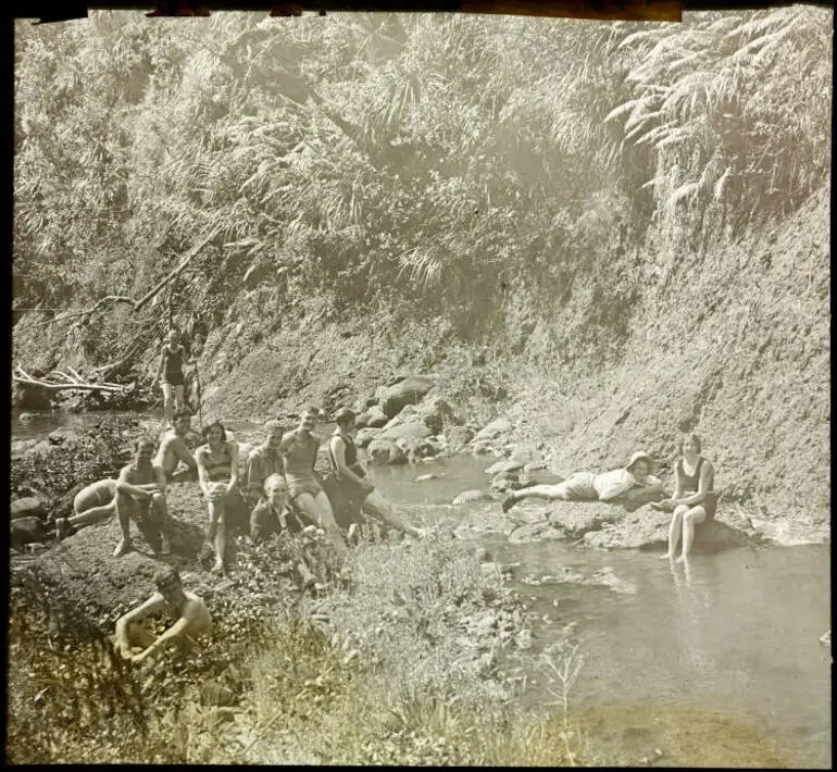 Image: Trampers by pool in the Waitākere Ranges