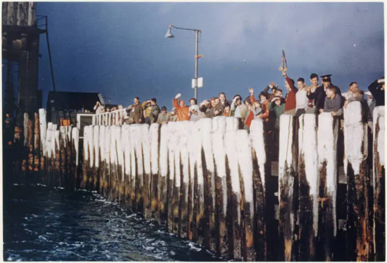 Image: Passengers line Victoria Wharf to farewell the final vehicular ferry, Devonport..