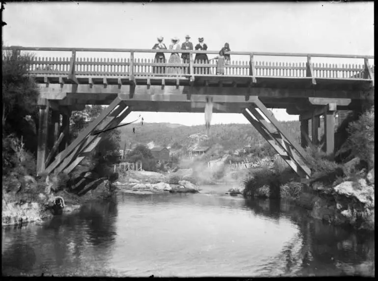 Image: Child jumping from the bridge at Whakarewarewa
