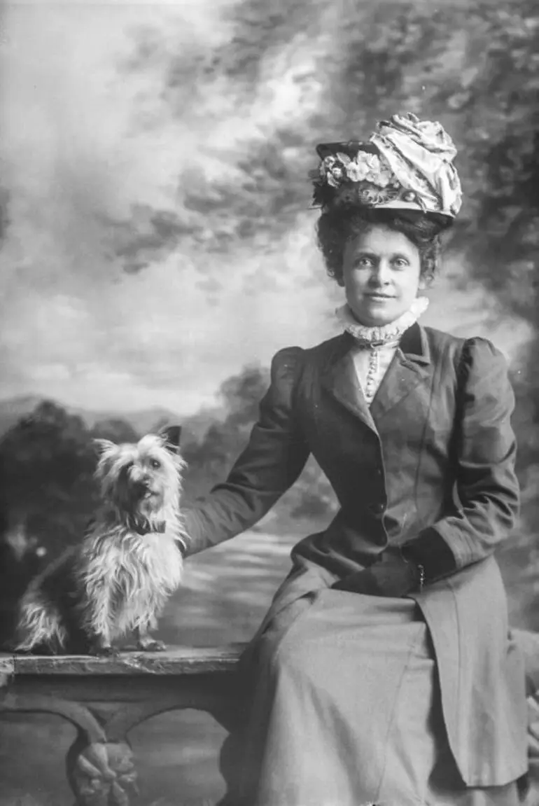 Image: Nurse Holman and dog, 1910