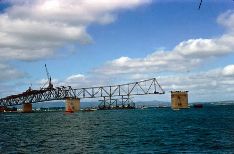 Image: Pick-a-back section being floated into place, Auckland Harbour Bridge, 1958