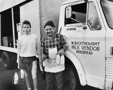 Image: Mr W. Buckthought, Birkenhead milk vendor, with assistant Stephen Pearson.