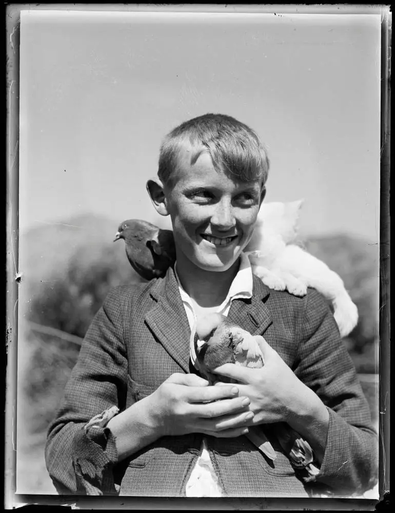 Image: Boy and his pets, Hawea Flat, 1940
