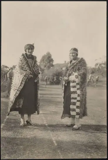 Image: Two women wearing kahu huruhuru