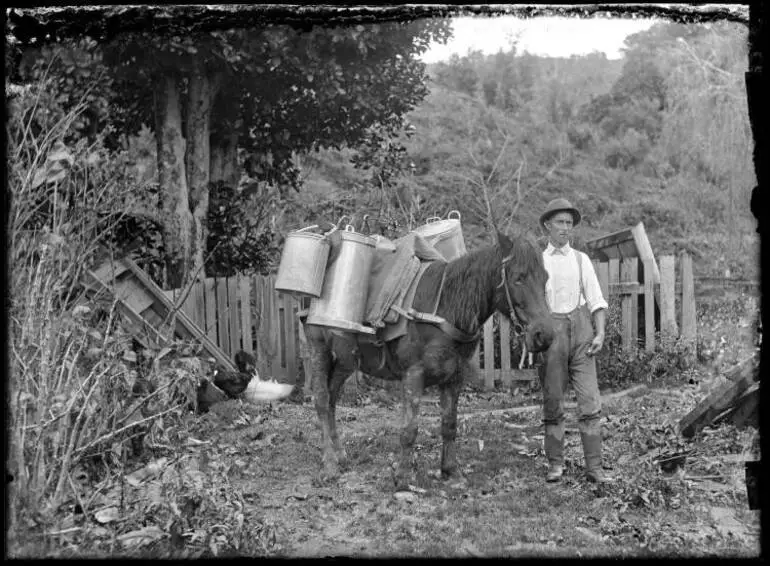 Image: Horse and cream cans