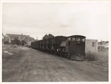 Steam engine shunts empty livestock wagons away from Westfield Freezing Works Image: Steam engine shunts empty livestock wagons away from Westfield Freezing Works