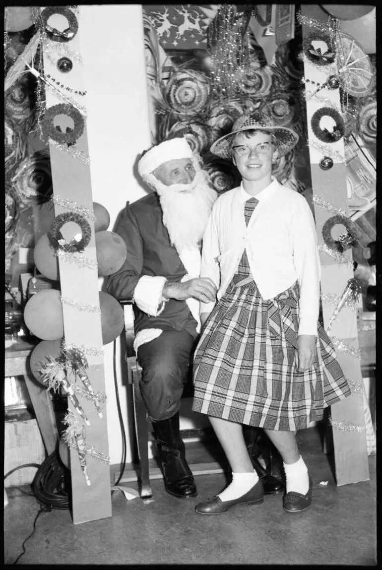 Image: Children sitting on Santa's knee, 1959