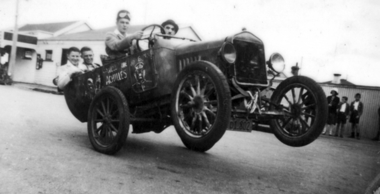 Image: Trick car travelling on rear wheels