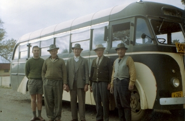 Image: Men in front of school bus