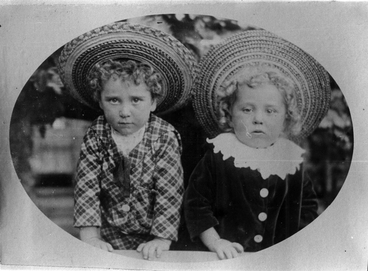 Image: Two young children with hats