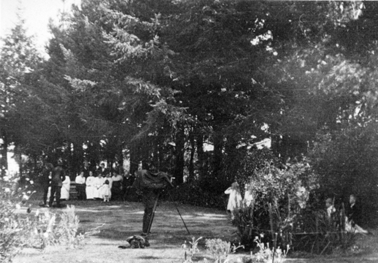 Image: Robert Gant in the process of taking a family photograph