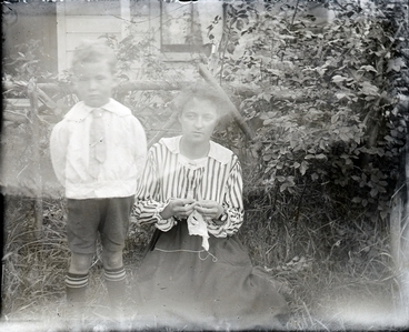 Image: Woman with a young boy : photograph