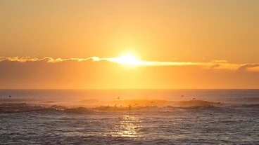 Image: Sunrise on Bushy Beach, Oamaru