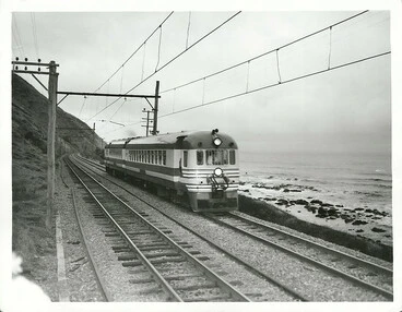 North Island New Zealand Blue Streak Rail Car travelling north between Pukerua Bay and Paekakariki main trunk line to Auckland Image: North Island New Zealand Blue Streak Rail Car travelling north between Pukerua Bay and Paekakariki main trunk line to Auckland