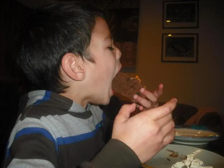 Image: Kaiya wasts no time on his birthday cake!