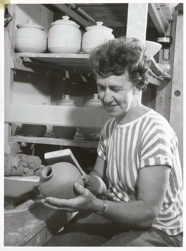Image: Dame Doreen Blumhardt - a noted New Zealand potter - shaping a pot she has just made.