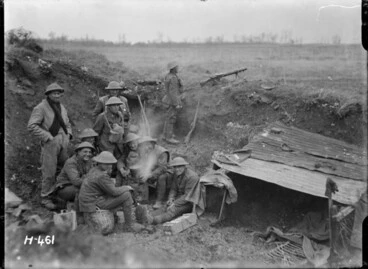 Image: New Zealand soldiers around a billy in a strong post, near Mailly-Maillet, France, during World War I