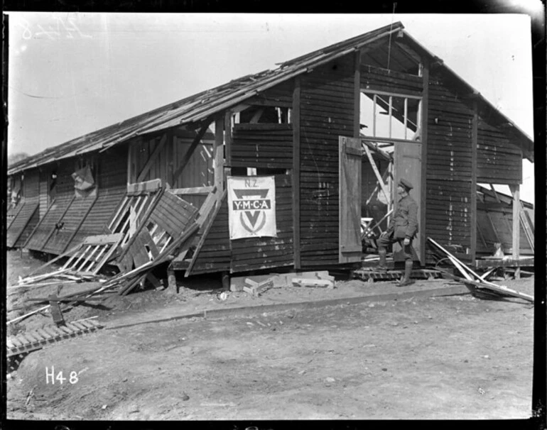 Image: Exterior of New Zealand YMCA hut hit by shellfire