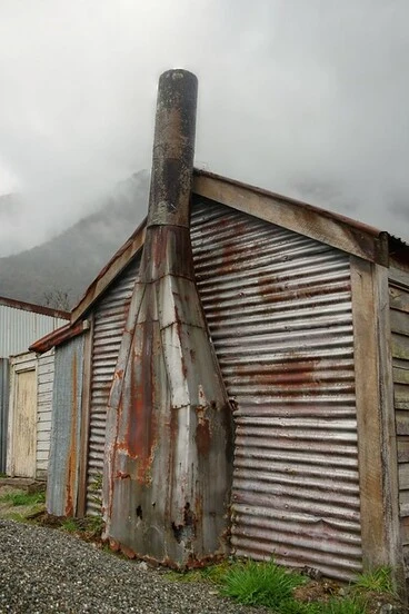 Old house, with metal chimney, Wainihinihi, West Coast, New Zealand Image: Old house, with metal chimney, Wainihinihi, West Coast, New Zealand