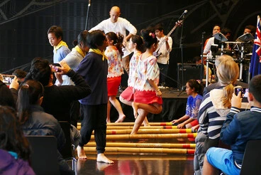 Image: Filipino Cultural Youth Group dancing Tinikling (Bamboo Dance)